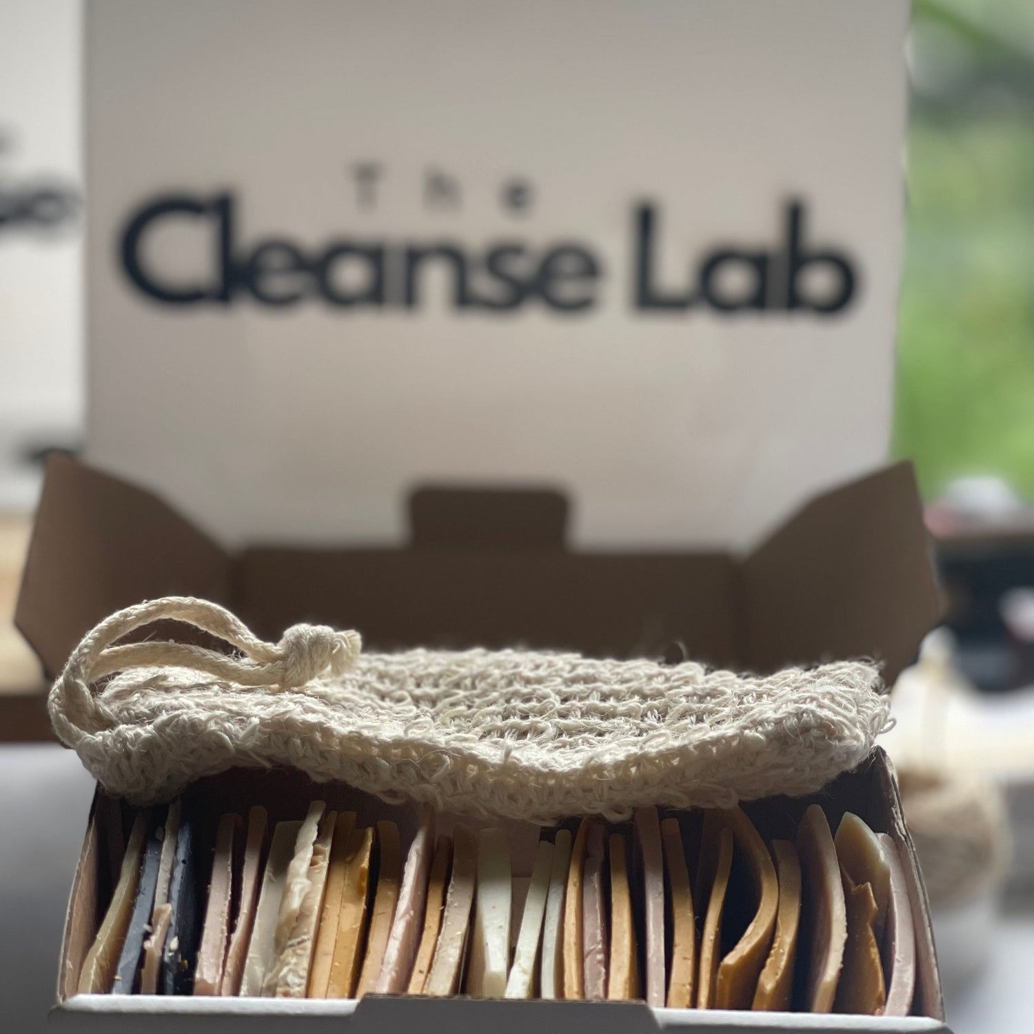 500g soap offcuts in box with soap exfoliating bag, front view